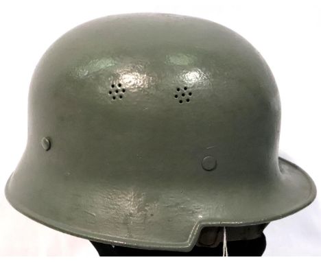 West German Post WWII helmet with liner and chin strap. P&amp;P Group 2 (£18+VAT for the first lot and £3+VAT for subsequent 
