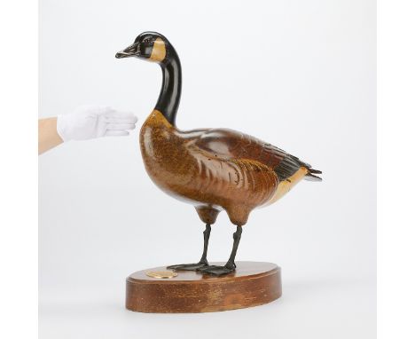 Tom Taber and Hersey Kyle Jr (American, 20th/21st c). Carved and painted wooden Canadian goose. With a plaque from North Dako