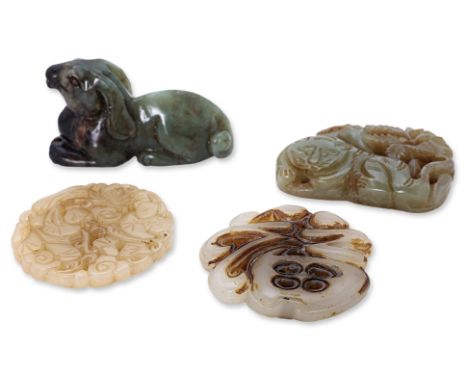 A GROUP OF FOUR JADE CARVINGS
Chinese, recumbent figural ram, an openwork disc with two figures, an openwork lion under tree 
