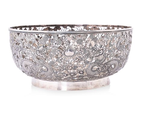 A CHINESE EXPORT PIERCED SILVER BOWL
Wang Hing, circa 1900, the sides pierced and engraved with dragons and flaming pearls am
