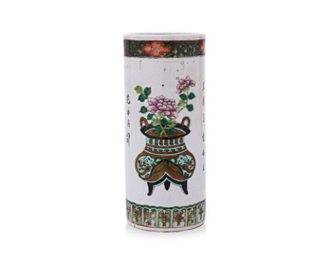 A FAMILLE ROSE CYLINDRICAL PORCELAIN VASE OR HAT STAND
Decorated with peony and jardiniére motifs alternating with Chinese ch