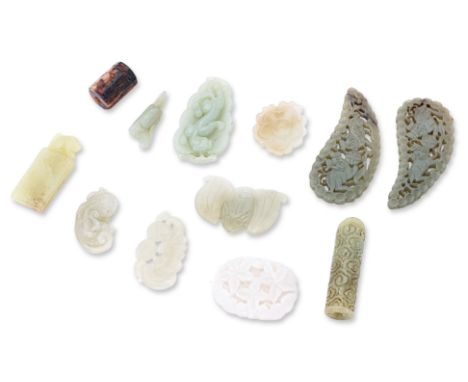 A GROUP OF 12 JADE CARVINGS
Various form including pair of openwork teardrop foo lion, qilong leaf pendant, bat, chop seal sh