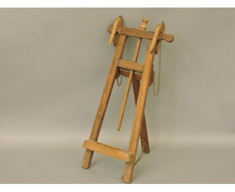 A pitch pine easel, 107cm tall, provenance: Ickworth House