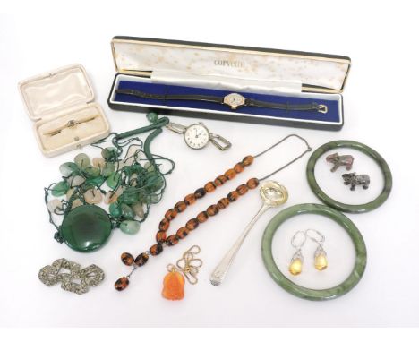 Two jade bangles, a gold sapphire and split pearl bar brooch stamped 9ct, an agate Buddha charm on a gold box link chain stam
