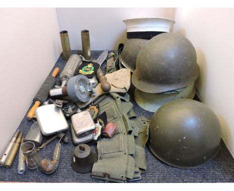 A Sestrel hand compass, a quantity of militaria, and other various items to include helmets, a kukri, a bandolier, etc