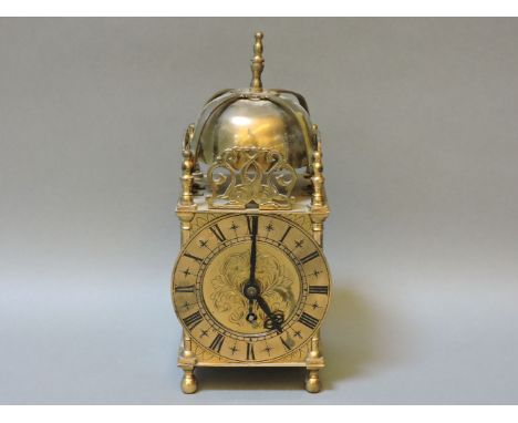 A brass lantern clock, in the 17th century style, with single train movement, 24cm high