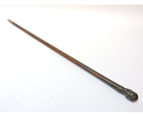 A Zulu walking stick, with carved ebony head, wooden shaft and horn end, 90cm long