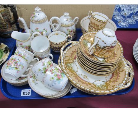 Continental Early XX Century Coffee Service, of sixteen pieces, hand pained with flowers within gilt boarder, late XIX Centur