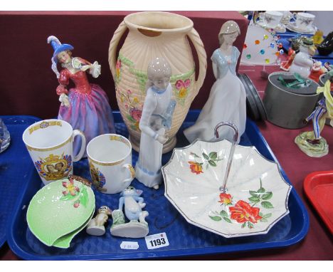 Midwinter Umbrella Cake Stand, Doulton 'Mariquita figurine (repaired), Nao and Casades examples Shelley Commemorative mugs, W