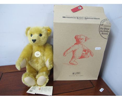 A Steiff 1909 Classic Teddy bear, gold plush with growler, with box, approximately 30cm high.