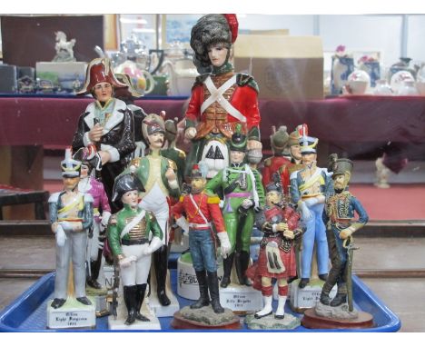 Black Watch Musical Decanter, 35cm high, eight ceramic military figures, three resin examples.