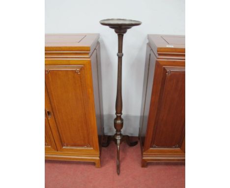 An Early XX Century Mahogany Plant Stand, with circular dish top, turned support and tripod legs, labelled George Laird, Glas