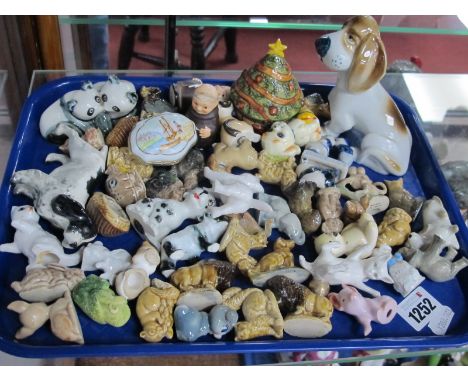 A Beswick Hound. Zsolnay Pecs dog 11cm high. Hummel mini monks, Wade Whimsies, two trinket boxes, etc:- One Tray.