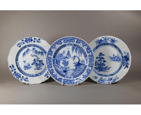 Three 18th century Chinese blue and white export plates, the two circular examples painted in underglaze blue with pagoda lan
