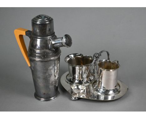 An Art Deco epns cocktail shaker with composite handle 23cm, to/w an Edwardian Art Nouveau cream and sugar pair on stand by C