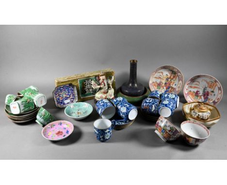 A mixed box of Asian ceramics and collectables including a pair of 18th century Chinese famille rose tea bowls and saucers pa