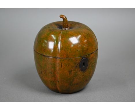 A turned and carved wood tea caddy in the form of a melon, 12.5 cm high 