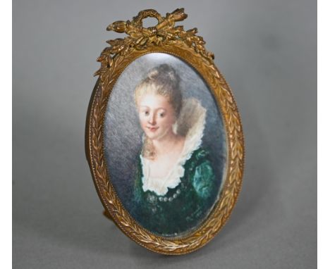 An early 20th century oval portrait miniature on ivory of a young lady in 17th century costume, signed M Rascol and dated 190