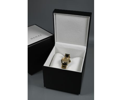 A Gucci wristwatch - SM light yellow diamante circa 2017, boxes with documents, tags, spare links etc (quartz movement)appear
