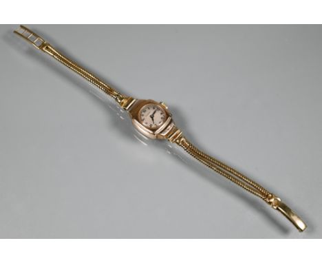 A vintage Rotary 9ct gold ladies wrist watch (approx. 17.6g all-in)tarnished but appears undamaged, the movement wound tight 