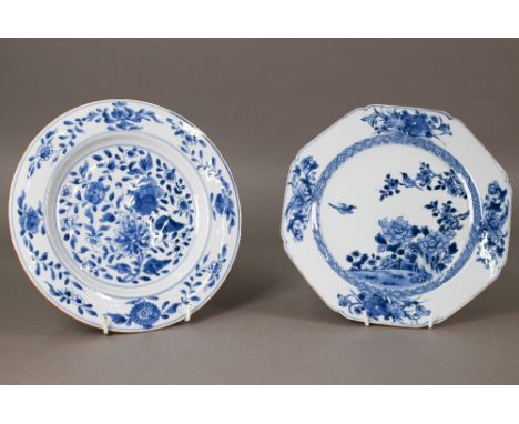 An 18th century Chinese blue and white octagonal plate painted in tones of underglaze blue with two birds in a fenced garden 