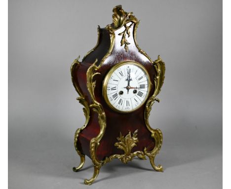 A 19th century gilt-metal mounted tortoiseshell mantel clock, the two train eight-day movement striking on a coiled gong, 48 