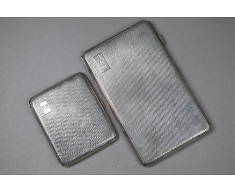 A heavy quality engine-turned silver cigarette case, Ernest W. Haywood, Birmingham 1946, to/w an smaller example, Smith &amp;