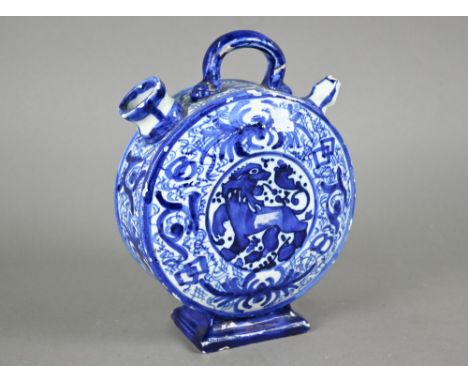 A 19th century Continental blue and white tin-glazed chevrette (water-carrier) of moon-flask form, painted with eagle and lio