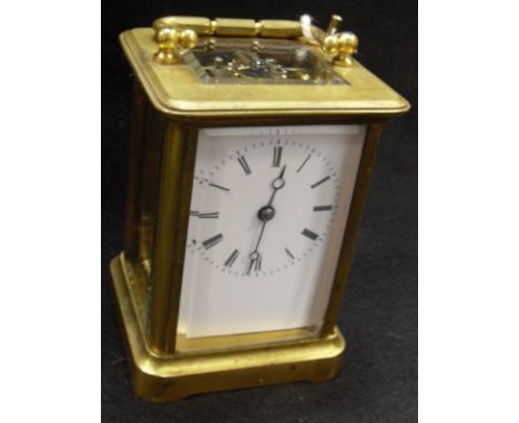 A circa 1900 French laquered brass cased carriage clock, the white enamel dial with Roman numerals   CONDITION REPORTS  Damag