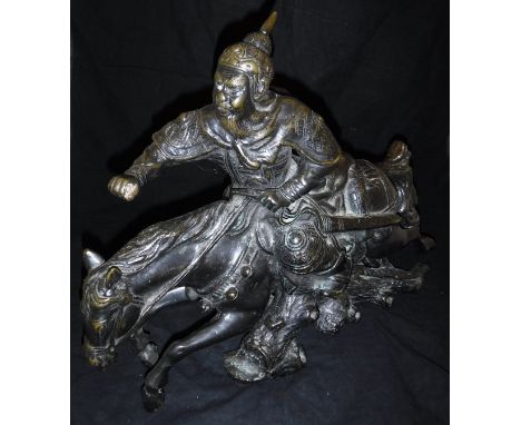 A Japanese bronze figure of a warrior on horseback   CONDITION REPORTS  Approx 56 cm long x 44 cm high.  Warrior appears to h