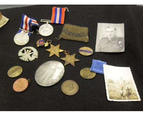 A collection of medals and ephemera relating to Private E Carter of The Duke of Cornwall's Light Infantry who served in World