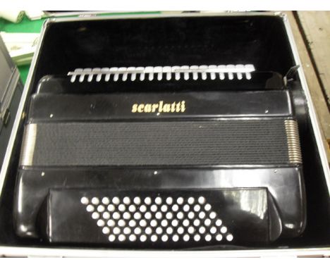 A Scarlatti piano accordion in fitted case, together with various accordion music books and other music books and a modern me