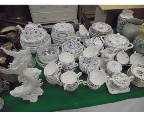 A collection of "Denmark" pattern blue and white dinner wares, a pair of Dresden fish ornaments and a Bavarian floral and gil