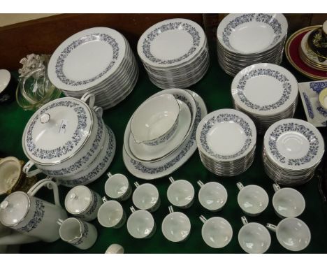 A Noritake "Royal Blue" dinner service, twelve place settings including large, medium and small plates, large and small bowls
