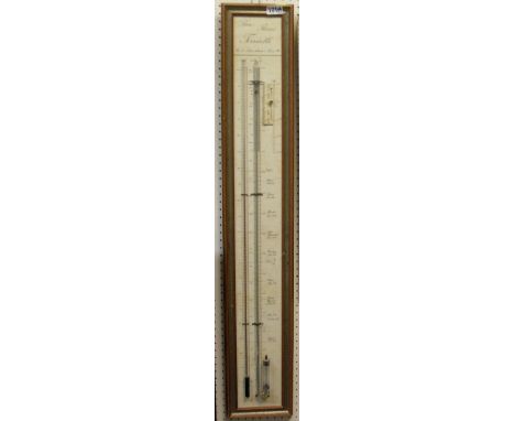 A modern Torricelli barometer, the papered back marked with the dates and places of varrious large weather events inscribed "
