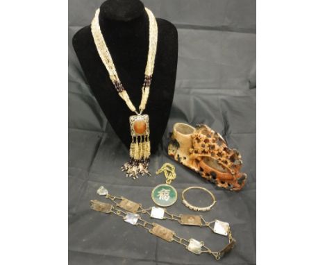 A bead work necklace with pierced and stone set pendant, together with an Arts and Crafts style copper and mother of pearl be