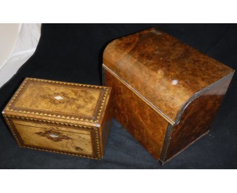 A Victorian walnut and parquetry inlaid tea caddy (interior missing) and a late Victorian burr walnut casket with rising lid