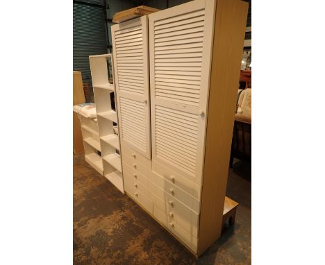 Two freestanding shelf units and two white bedroom cupboards with lower drawers 