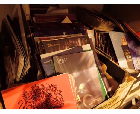 Shelf of theatre programmes 