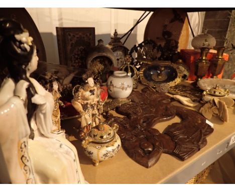 Shelf of mainly eastern brass and ceramics and wooden plaques 