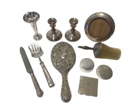 Group of silver, mostly dressing table items, including a pair of weighted candlesticks, a weighted spill vase, a frame, a pa