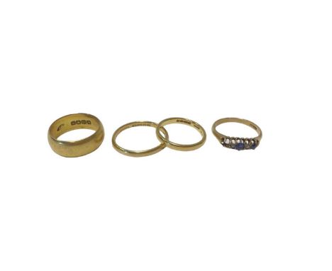 Three 22ct gold wedding rings and an 18ct gold sapphire and diamond ring with missing stone (4)The 22ct rings weigh 12.43g in