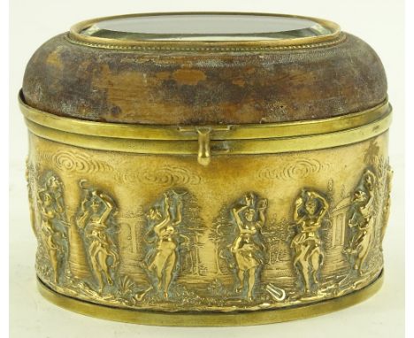 A 19th century brass jewel casket, glass panel inset lid and relief classical figure decorated surround, length 13cm.