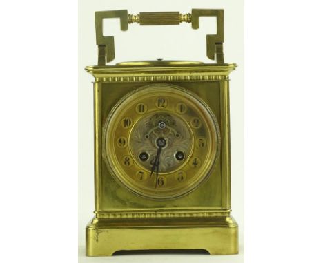 A large 19th century French brass cased carriage clock, the top having an inset aneroid barometer, engraved brass dial with 8