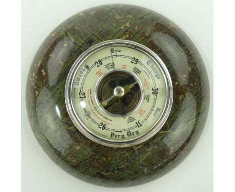 A serpentine marble barometer by Shortland Smith, diameter 15.5cm.
