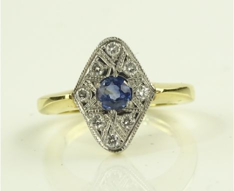 An 18ct gold sapphire and diamond set lozenge panel ring, setting height 15mm, size N.