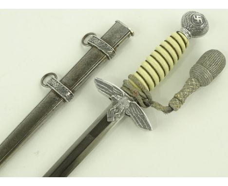 A German Third Reich Luftwaffe Officer's dagger, plated hilt with white composition grips, blade marked Krebs, original plate