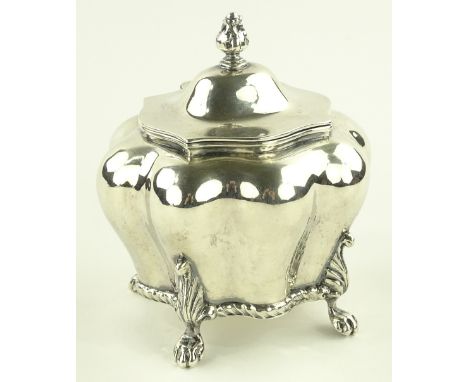 An Edwardian silver tea caddy of lobed oval form resting on cast feet, by Nathan & Hayes, Chester 1904, height 11cm, 7.2 oz.