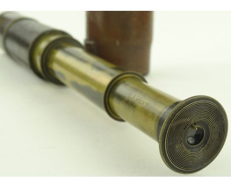 A First War period 4-draw brass field telescope by Ross of Londonn, leather cased, case length 17cm.