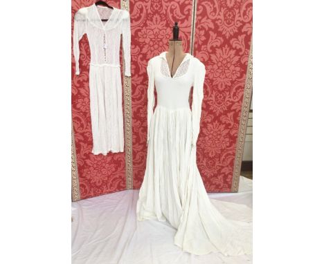 A selection of vintage evening/wedding dresses, to include white lace with dropped waist, loop and button front detail, a whi